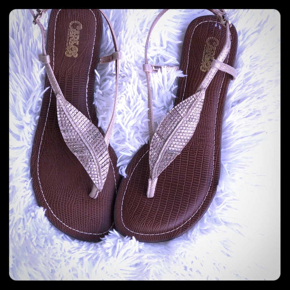 Carlos flat gold feather sandal